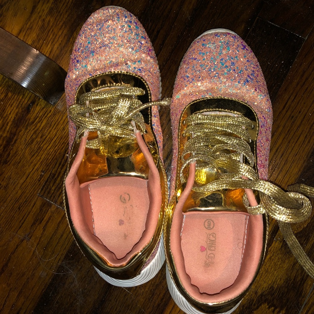 Pink sparkly tennis shoes. Worn a few times